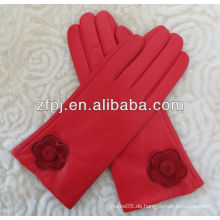 Dame kleidet meistverkaufte Art reizvolle rote lederne Handschuhe